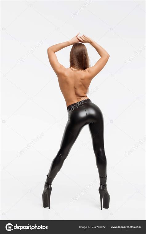 Attractive Charming Naked Woman In Leather Trousers And High Heels Stock Photo 3kstudio
