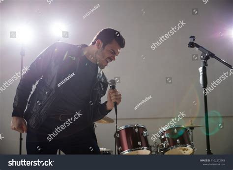 rock band lead singer singing  stock photo  shutterstock