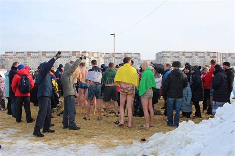 Orthodox Holiday Baptism In Russia A Crowd Of Naked People Plunge Into The Icy Water In Winter