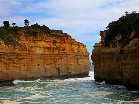 Aerial Photography Of Rock Formation In Body Of Water Hd Wallpaper