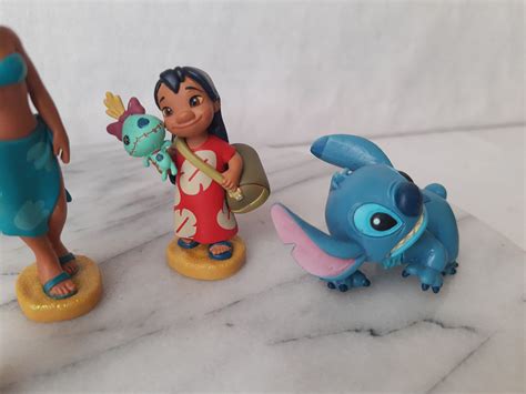 Irmã Da Lilo E Stitch Personagens - Miniatura Disney de vinil de Lilo e Stitch, irmã da Lili e namorado ...