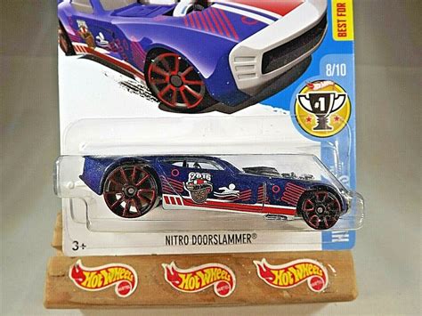 Hot Wheels HW Games NITRO DOORSLAMMER Dark Blue W Red Trap Spoke Contemporary