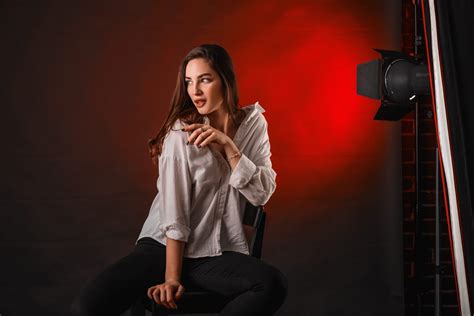 Обои women brunette women indoors model studio chair jeans black jeans white shirt