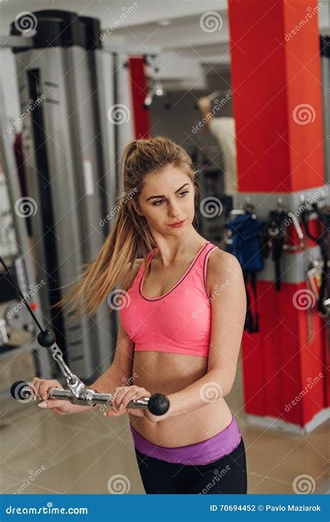 Blonde Performs An Exercise On The Simulator Stock Photo Image Of Figure Abdominal