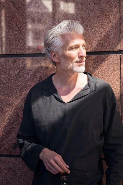 Premium Photo Portrait Of A Mature Man Looking Curious