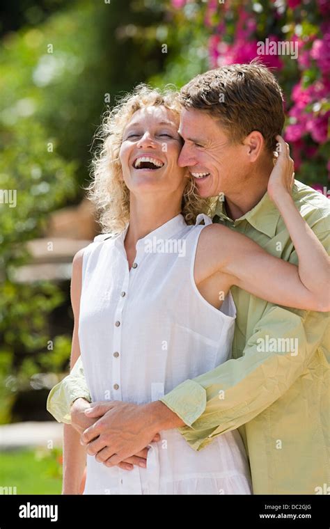 A Mature Couple Hugging Stock Photo Alamy