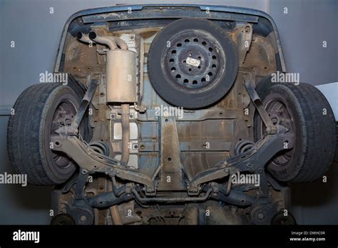 Car Underbody Rear Wheels Exhaust Pipe And Suspensions Of Used Vehicle