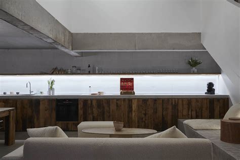 Rotunnojustman Combines Naked Concrete Details With Brick To Form Sleek Interiors For Photo Studio