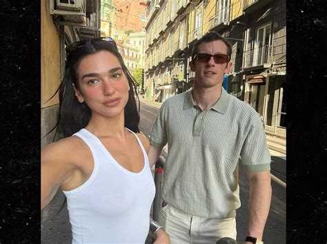 Dua Lipa Soaks Up Sun In Tiny Silver Bikini On Vacation