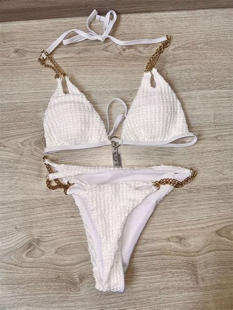 Weisser Bikini mit goldenen Ketten Grösse XS Neu gemäss Beschreibung in Allschwil für CHF 10