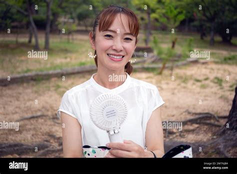 Mature Japanese Woman In White Hi Res Stock Photography And Images Alamy