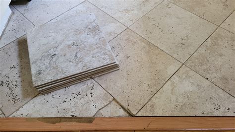 Landlord refuses to replace broken tile. Our rent is $3257/mo. : r