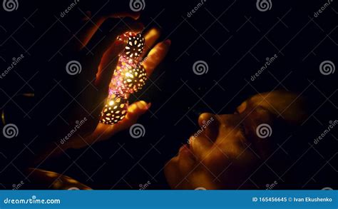 Magic Hot Light From Lanterns Falls On The Woman Eyes The Naked Adult Caucasian Girl Lies At