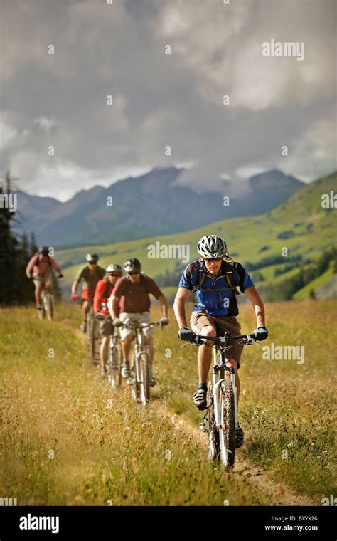 Men Mountain Biking On Trail Stock Photo Alamy