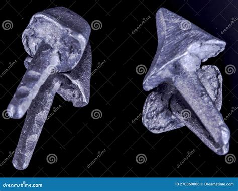 Two Cast Metallic Post And Core For Crown Reconstruction Build Ups Or