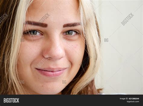Brunette Teenage Girl With Blue Eyes