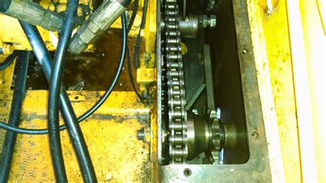 Mustang 940 Skid Loader: Bearing, Chain, and sprocket replacement