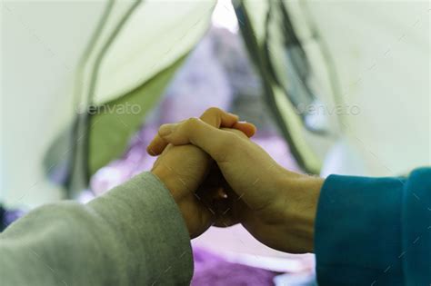 Unrecognizable Gay Couple Holding Hands Inside A Tent Camping Concept Stock Photo By Albertocase
