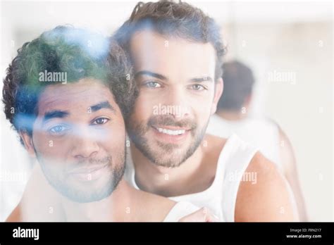 Smiling Gay Couple Smiling At Camera Stock Photo Alamy