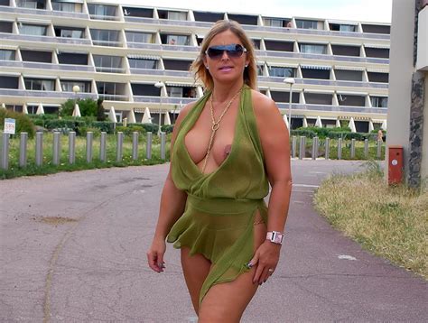 Almost Nude Milf In Transparent Dress Showing Her Big Boobs And Pussy