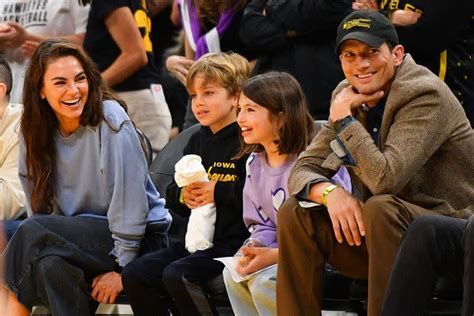 Ashton Kutcher and Mila Kunis Have a Cute 'Love Story' Moment at Taylor ...