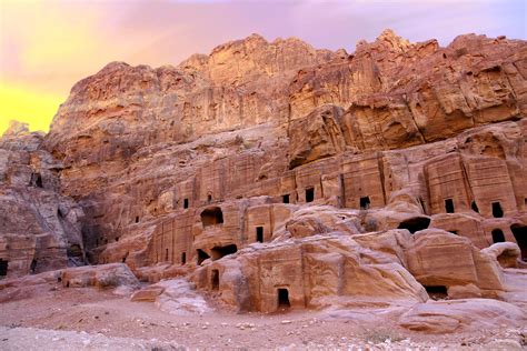 Petra, originally known to the Nabataeans as Raqmu, is a historical and ...