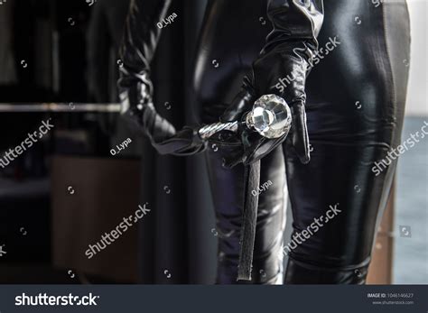 Mistress Holds Whip Behind Ass Closeup Stock Photo Shutterstock