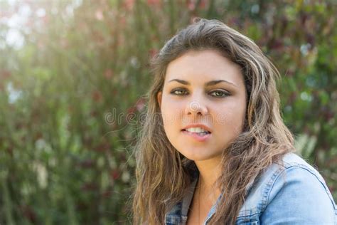 Brunette Teenage Girl Is Biting Her Lips Stock Photo Image Of Cool Head