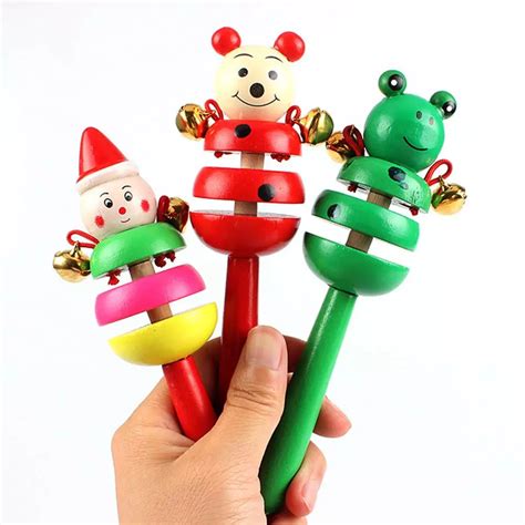 Развивающая музыкальная игрушка трещотка с колокольчиками (1 шт) от ...