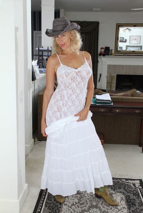 Sassy Mature Cowgirl Undressing And Exposing Her Hairy Twat In Close Up CoedCherry