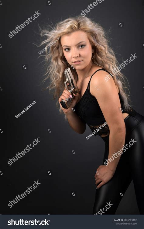 Sexy Blonde Woman Gun Foto Stok 1726029202 Shutterstock