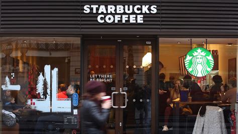 Starbucks staff set for pay rise after chain extends national living