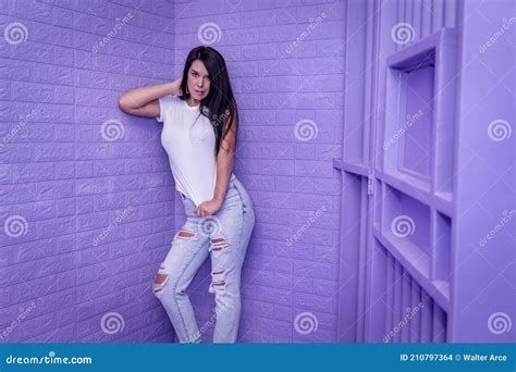 A Lovely Brunette Model Sits In A Lavender Jail Waiting To Plead Her Case Stock Photo Image Of