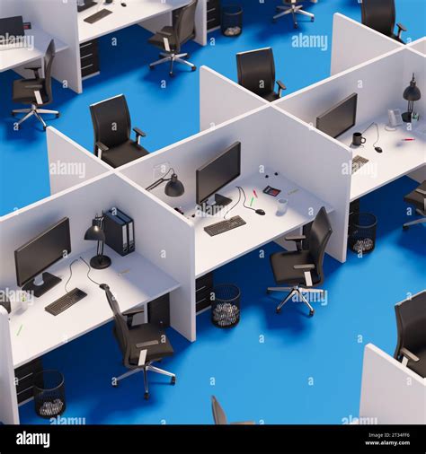 High Angle View Of Cubicles With Tables Chairs And Computers In A