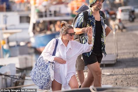 Helen Flanagan Shows Off Her Taut Physique In A Blue Primark Bikini In Italy Daily Mail Online