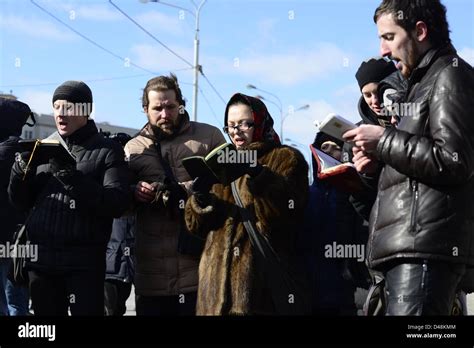 Group Of Christian Activists Read Bible Aloud On Picket To Free Pussy Riot Members On March
