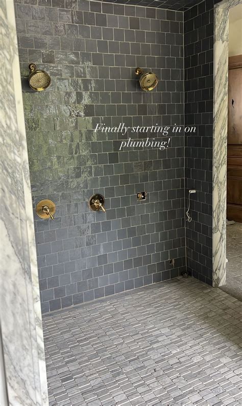 Modern Grey Bathroom with Gold Fixtures