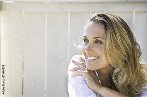 Portrait D Une Femme Blonde Souriante Buy This Stock Photo And Explore Similar Images At Adobe