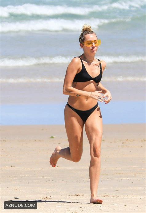 Miley Cyrus Wears A Black Bikini At The Beach In Byron Bay Australia Aznude