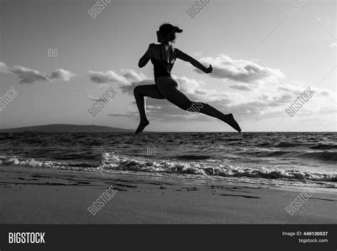 Woman Run On Beach Image And Photo Free Trial Bigstock