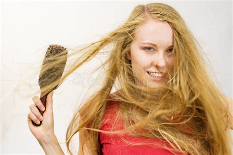 Blonde Girl Long Blowing Hair Holds Natural Bristles Brush Stock Image Image Of Long Messy