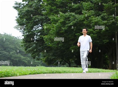 Mature Man Walking Stock Photo Alamy
