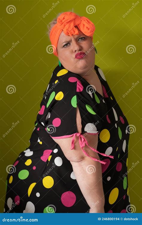 Plus Size Model Woman With Trendy Makeup Fashionable Blonde In Black Short Dress Posing At The