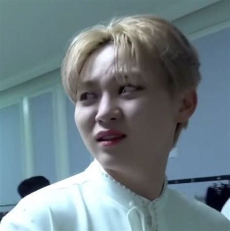 Man With Blonde Hair In White Shirt