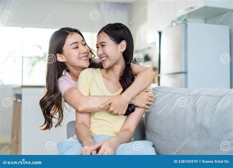 Asian Beautiful Lesbian Women Couple Hugging Girlfriend In Living Room Attractive Two Female
