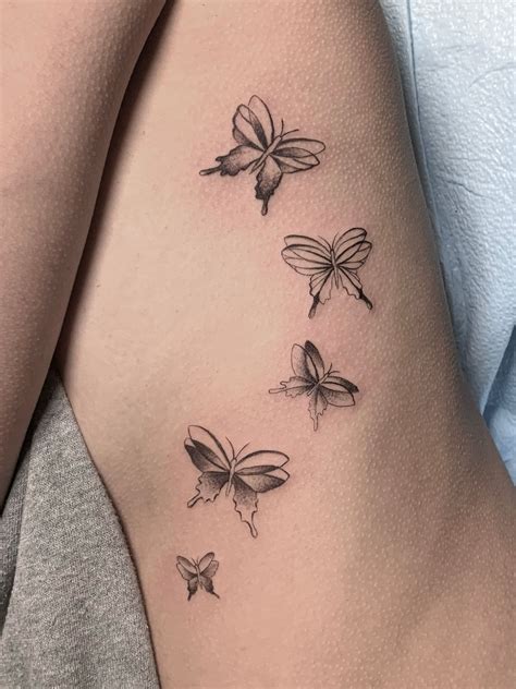 Simple Butterfly Tattoo On Hand