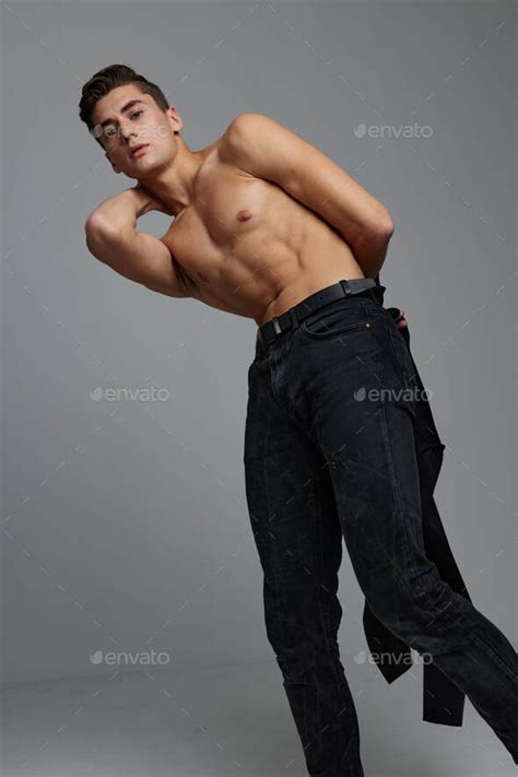 Handsome Man In Black Trousers Nude Torso Charm Self Confidence Stock Photo By Shotprime