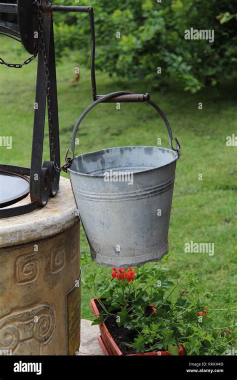 Bucket At The Well Bucket Of A Water Well Stock Photo Alamy