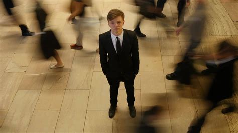 Man Standing Out Of The Crowd People Walking on Crowded Street 41181852