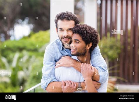 Happy Gay Couple Hugging Stock Photo Alamy